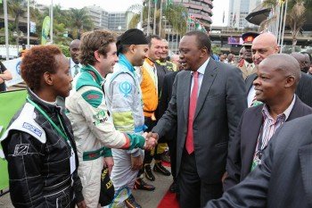 President Uhuru Kenyatta congratulating Quentin Mitchell